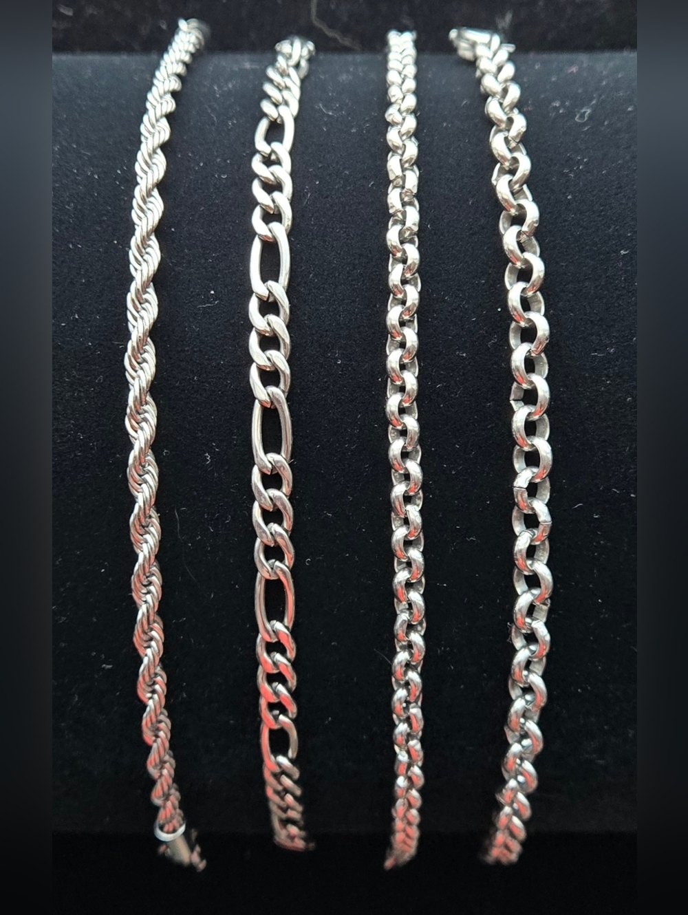 Set Of 4 Steel Stacking Bracelet Set.